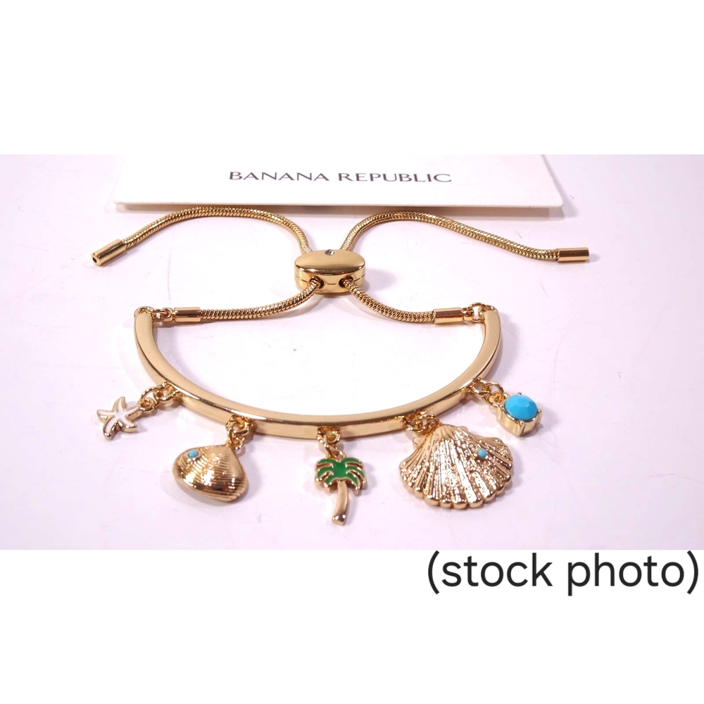 Banana Republic Gold tone and Blue Charm Bracelet